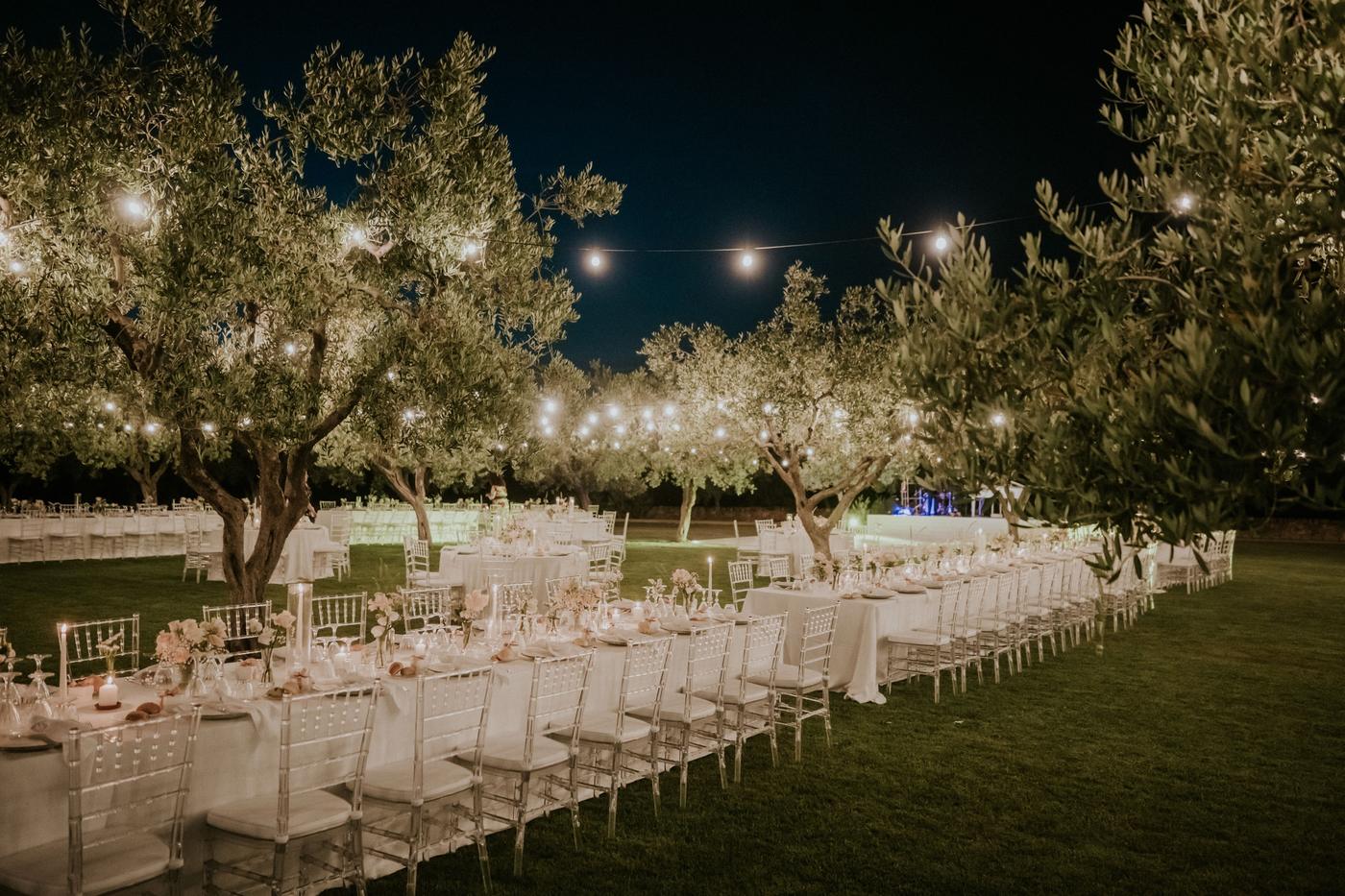Evening wedding reception in the olive grove at Masseria Don Luigi, Fasano
